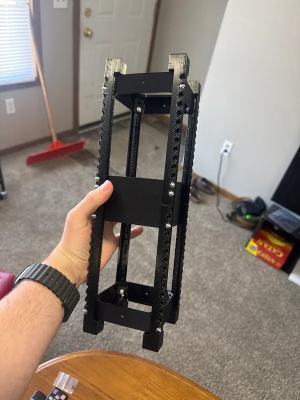 Assembled black Destination Dirt frame with open sides and visible internal mounting features.