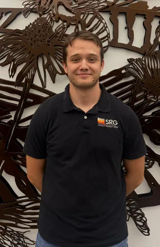 Portrait of John Schwab wearing an SRG polo shirt.